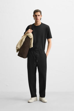 CARROT FIT TROUSERS