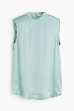 Blusa con hombreras