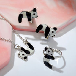Цена за 3 шт. Набор «Выбражулька» 3 предмета: клипсы, кулон, кольцо, панды, чёрно-белый в серебре