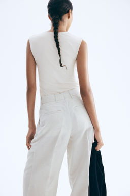 Top sin mangas en microfibra - H&m фото 6