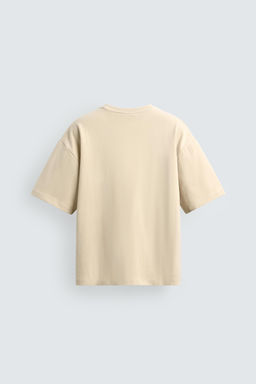 CAMISETA PARCHE TEXTURA COMBINADA / Blanco roto