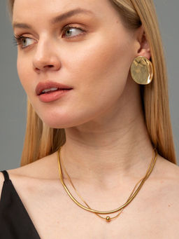 Серьги из металла золотистого цвета - Модные истории фото 5