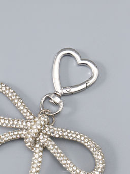 Цена за 2 шт. Брелок на карабине "Бант со стразами" серебро 11х7,5х1,5 см
