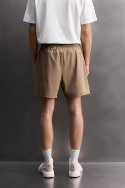 PANTALONES CORTOS T?CNICOS TRAINING / Marr?n claro