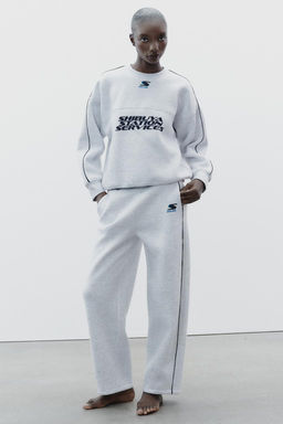 TEXT TROUSERS WITH TRIM