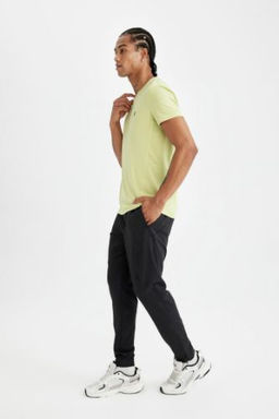 DeFactoFit Jogger Esofman Alt? Slim Fit Dar Kesim Dokuma Uc Cepli Fermuarl? Paca