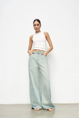 Джинсы-палаццо с потертостями Light green