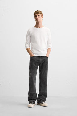 FLARED JEANS WITH PATCH