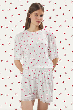 Trendyolmilla Beyaz Kalpli ve Sloganl? Dantel Detayl? Fitilli Sortlu Orme Pijama Tak?m? THMSS25PT00338