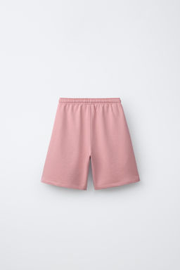 CONJUNTO CAMISETA Y BERMUDA TEXTO / Rosa lavado
