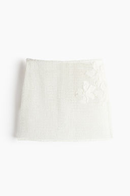 Falda playera con detalles bordados