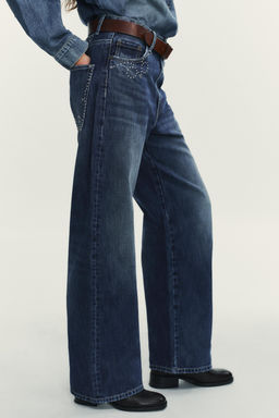 TRF JEANS WITH METAL STUDS