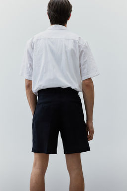 Camisa en tejido texturizado Regular Fit - H&m фото 6