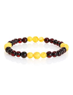 Эффектный браслет из натуральных янтарных бусин-шаров Пекин