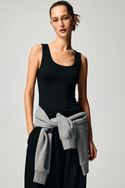 Top sin mangas en microfibra - H&m фото 10