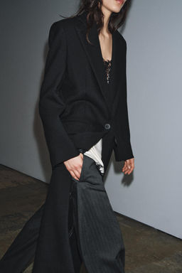 100% WOOL LIMITED EDITION COAT