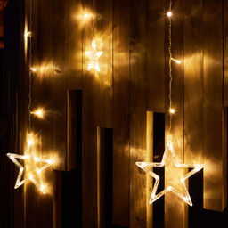 ULD-E3007-138/DTA WARM WHITE IP20 STARS-2 Занавес фигурный светодиодный, 3х0,7м. 138 светодиодов. Теплый белый свет. Провод прозрачный. TM Uniel - Volpe фото 3