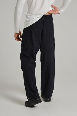 Брюки текстильные Черный COMMUTE Woven Track Pants - Anta фото 5