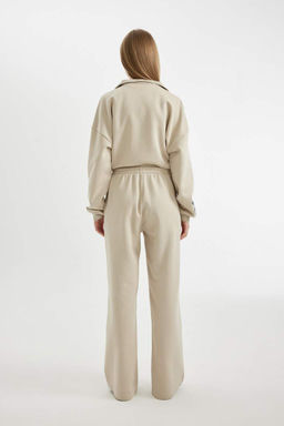 Простые спортивные штаны с широкими штанинами, эластичной талией, шнуровкой, карманами и широкими штанинами - Defacto фото 6