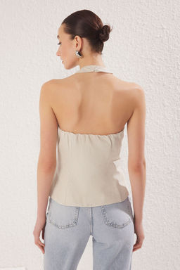 Trendyolmilla Bej Keten Gorunumlu Capraz Halter Yaka Yelek Dokuma Bluz TWOSS25BZ00255