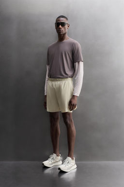 PANTALONES CORTOS RUNNING 2 EN 1 / Morado