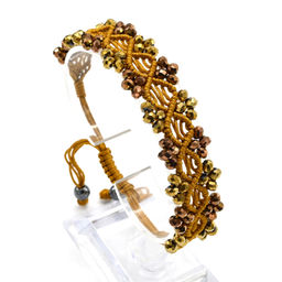 Браслет плетеный с цирконами горчичный