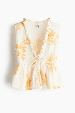 Top de muselina con peplum