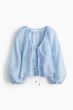 Blusa en mezcla de lino con lazadas