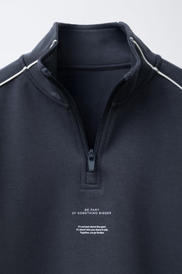 SWEATSHIRT WITH CONTRAST PIPING AND SLOGAN
