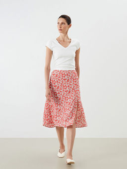 Beli Lastikli ?i?ekli Y?rtma?l? Etek