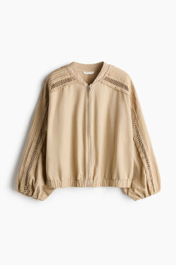 Chaqueta en mezcla de lino con detalle de encaje