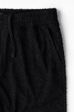 Pantalon corto en tejido rizado Relaxed Fit - H&m фото 6