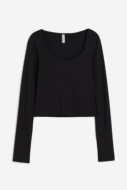 Top de manga larga en punto