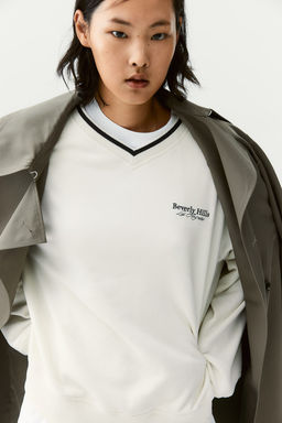 Sudadera con escote de pico