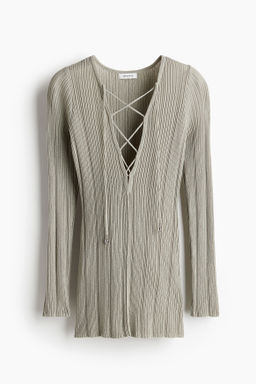Top con cord?n decorativo
