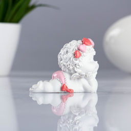 Фигура Ангел лежит личико на ручках 8?5.5?6.5 см