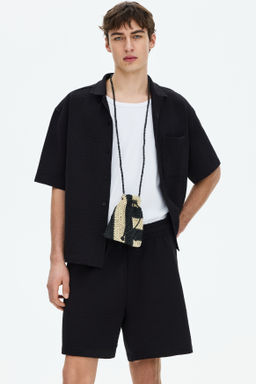 Pantal?n corto gofrado Relaxed Fit - H&m фото 4
