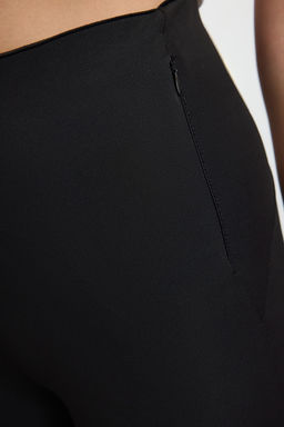 TRENDYOLMILLA Siyah Toparlay?c? Fermuarl? Cep Detayl? Tam Boy Orme Spor Pantolonu THMAW25TY00019  фото 6