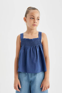 Блузка с бретелями для девочки