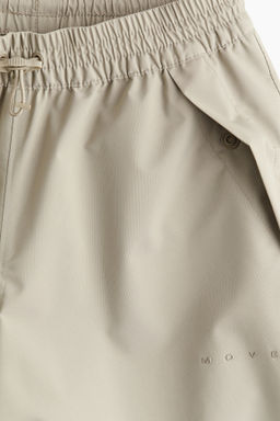 Pantal?n chubasquero unisex con StormMove - H&m фото 5
