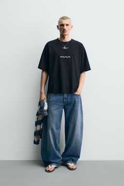 SUDADERA MANGA CORTA TEXTOS ESTAMPADOS / Negro