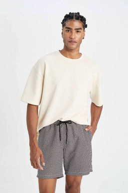 Короткие шорты для плавания стандартного кроя с сетчатой подкладкой и рисунком