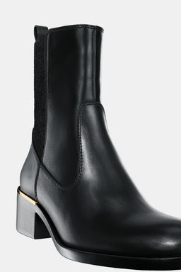 HEELED ANKLE BOOTS