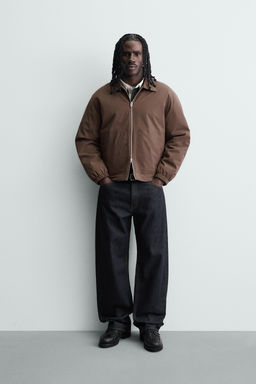 CAZADORA T?CNICA RELAXED FIT / Marr?n