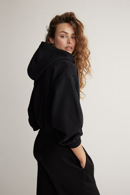 Chaqueta de deporte con capucha y cremallera