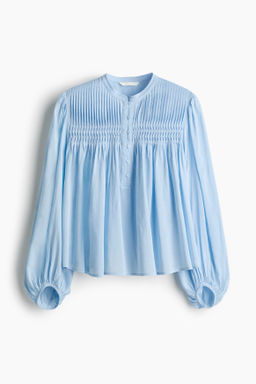 Blusa con jaretas