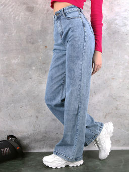 Джинсы женские трубы