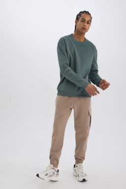 DeFactoFit Sporcu Jogger Esofman Alt? Standart Fit Uc Cepli Beli Bagc?kl? Lastikli Paca