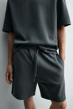 BERMUDA JOGGER RELAXED FIT INTERLOCK / verde lavado - Zara фото 5
