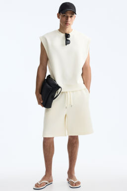 Camiseta sin mangas efecto neopreno Relaxed Fit - H&m фото 8